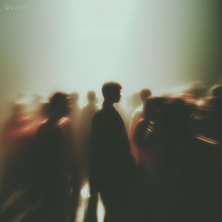Still, while the crowd blurs past.